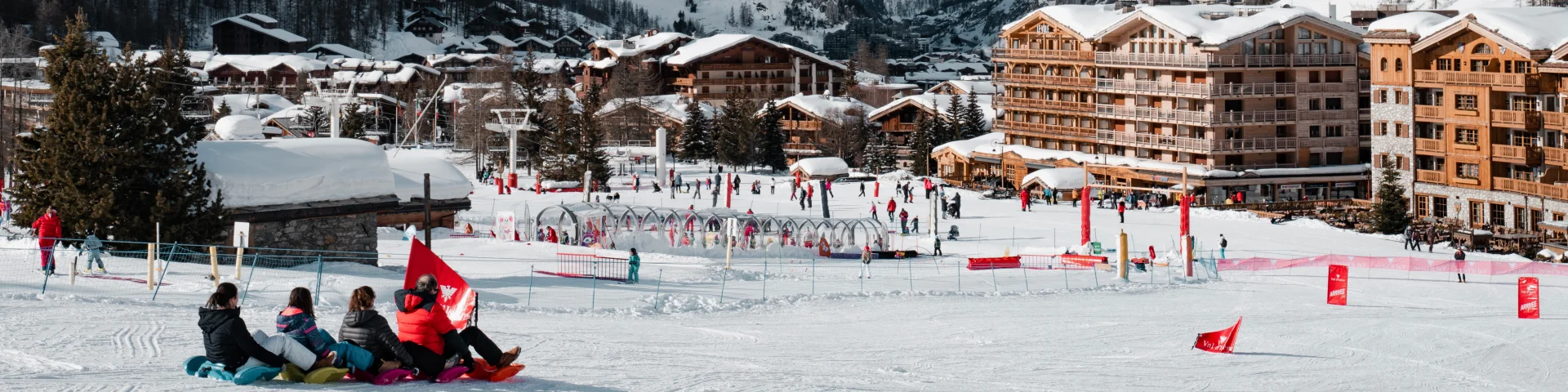 Snake Gliss en famille à Val d'Isère en hiver sur la piste de la Savonnette